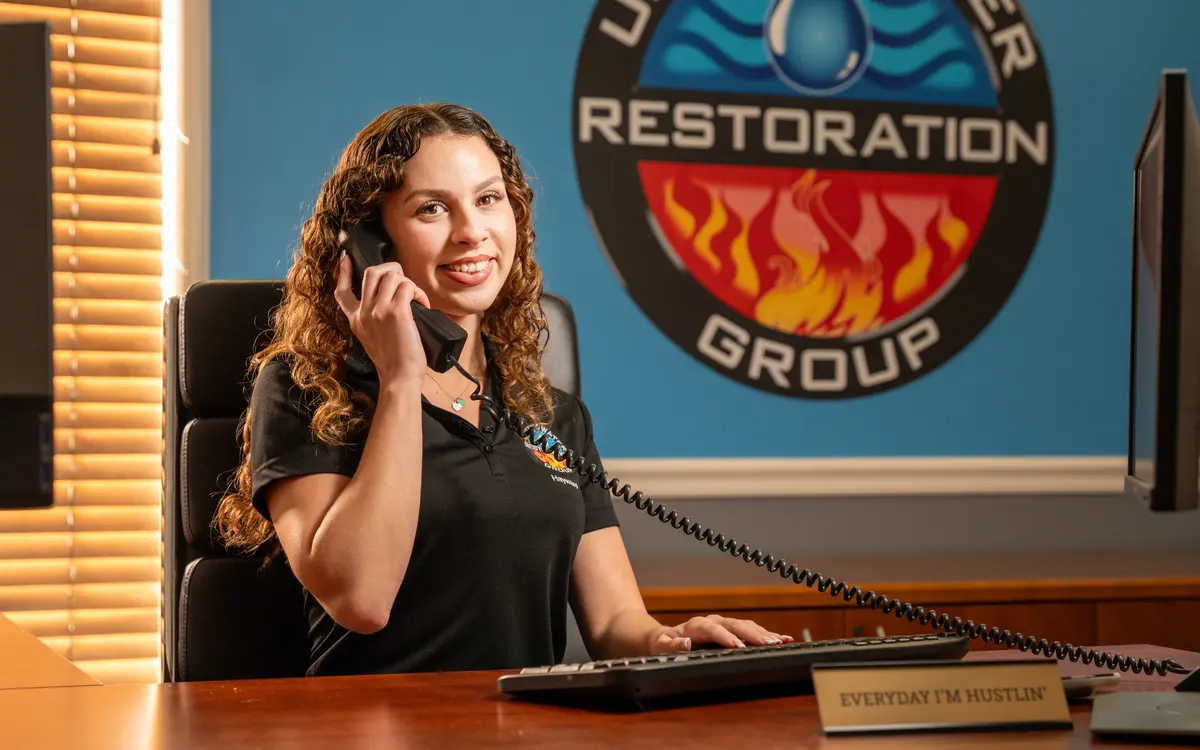 A member of our office team answering a service call